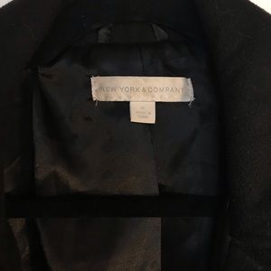 Elegant black pea coat with ruffle collar